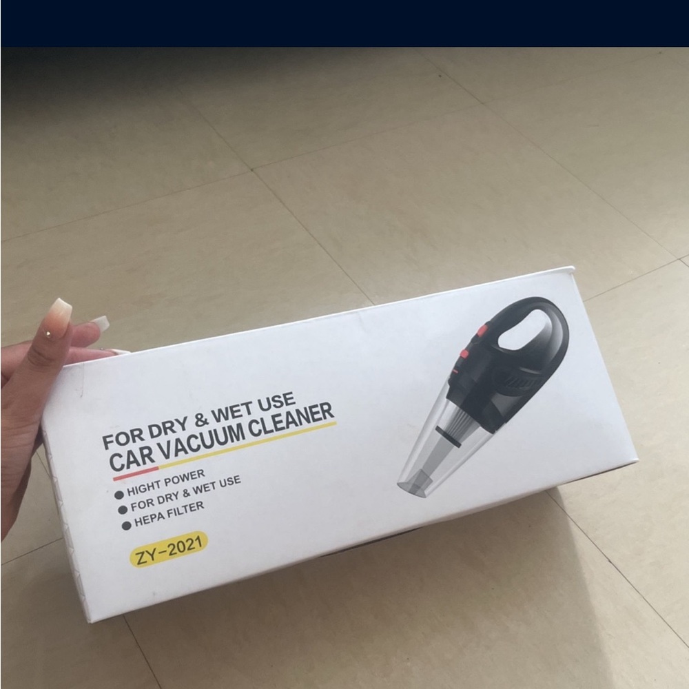 Black and Silver Car Vacuum Cleaner
